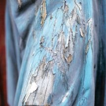 Degradation of polychromy on wooden statue in the exterior